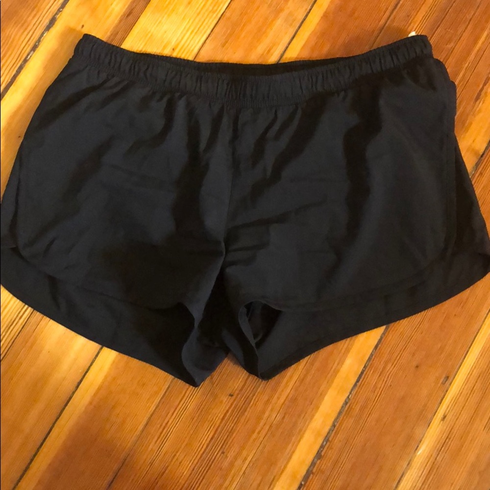 Black running shorts- size M
